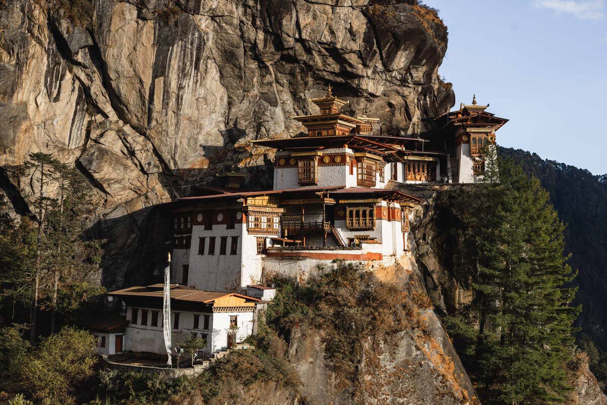 Tiger's Nest Monastery (Paro Taktshang) clinging to the cliff face above the Paro Valley, Bhutan